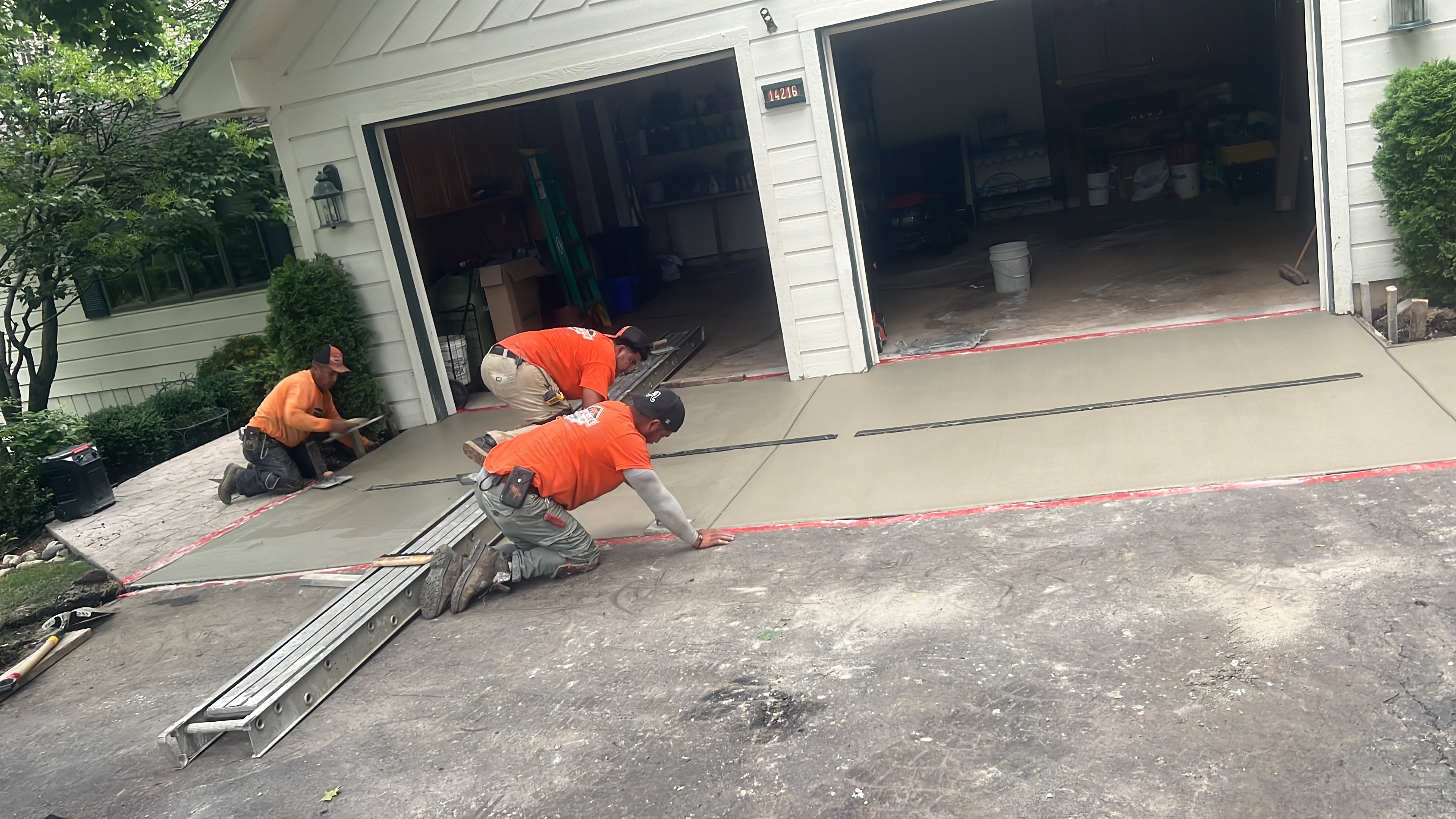 Concrete driveway partition project by PFS Concrete & Asphalt